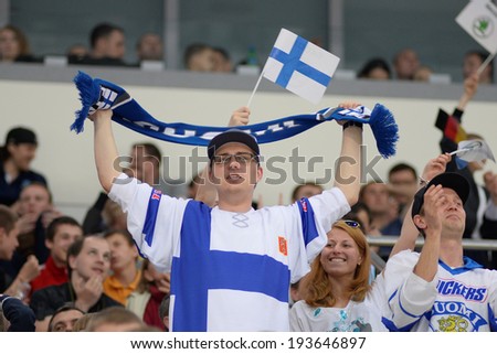 MINSK, BELARUS - MAY 19: Fans of Finland during 2014 IIHF World Ice Hockey Championship match at Minsk Arena on May 19, 2014 in Minsk, Belarus.