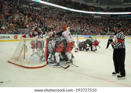 MINSK, BELARUS - MAY 19: Players of Belarus and Latvia fight during 2014 IIHF World Ice Hockey Championship match on May 19, 2014 in Minsk, Belarus.