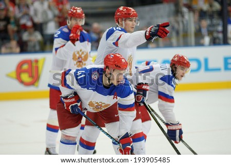 MINSK, BELARUS - MAY 20: KULYOMIN Nikolai of Russia with team during 2014 IIHF World Ice Hockey Championship match on May 20, 2014 in Minsk, Belarus.