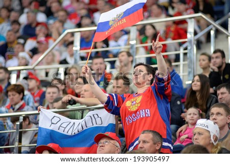 MINSK, BELARUS - MAY 20: Fans of Russia during 2014 IIHF World Ice Hockey Championship match on May 20, 2014 in Minsk, Belarus.