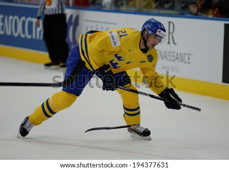 MINSK, BELARUS - MAY 22: ERICSSON Jimmie of Sweden shoot the puck during 2014 IIHF World Ice Hockey Championship quarterfinal match on May 22, 2014 in Minsk, Belarus.