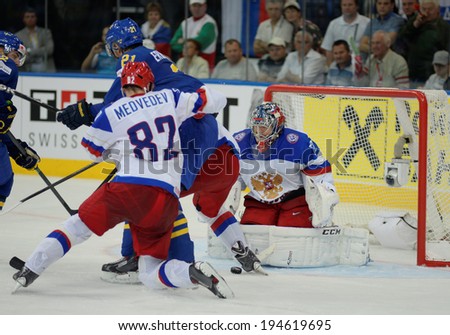 MINSK, BELARUS - MAY 24: BOBROVSKI Sergei (72) of Russia saves the puck during 2014 IIHF World Ice Hockey Championship semifinal match at Minsk Arena on May 24, 2014 in Minsk, Belarus.