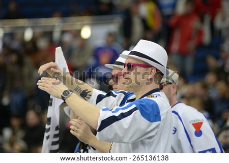 MINSK, BELARUS - MAY 16: Fans of Finland celebrate during 2014 IIHF World Ice Hockey Championship match at Minsk Arena on May 16, 2014 in Minsk, Belarus.