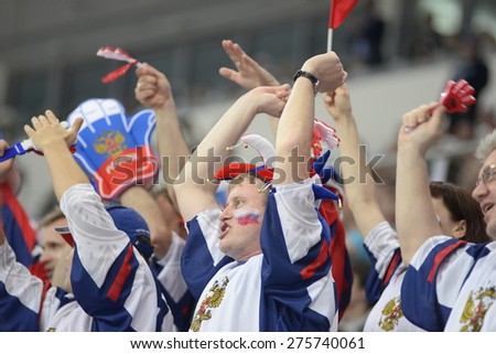 MINSK, BELARUS - MAY 20: Fans of Russia during 2014 IIHF World Ice Hockey Championship match at Minsk Arena on May 20, 2014 in Minsk, Belarus.