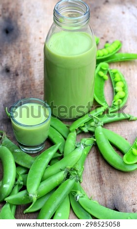 Fresh green soybeans and milk, green tea on wood vintage