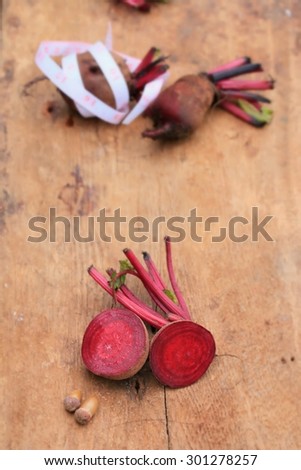 fresh vegetables beetroot and tape measure