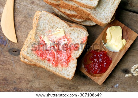 Slice toast whole wheat bread with strawberry jam