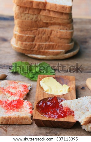 Slice toast whole wheat bread with strawberry jam
