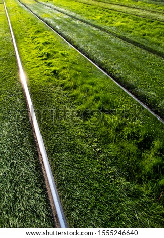 Similar – Foto Bild Schienen durch grüne Wiese