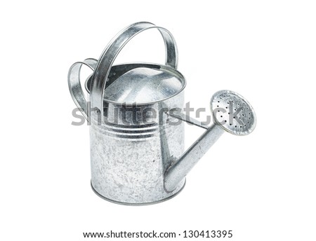 Steel made, silver colored watering can, isolated on white background.
