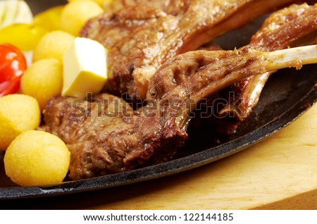 Japanese cuisine .Japanese spare ribs on a plate .meat lamb on rib