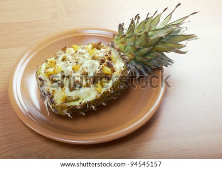 roast meat with cheese  grilled  in pineapple .closeup