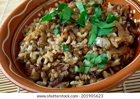 Mujaddara  is the Arabic lentils among the rice resemble pockmarks  saying in the Eastern Arab world