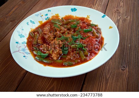 Turkish dish with minced beef, green beans in tomato sauce