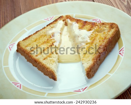 Milk toast -  breakfast food  of toasted bread in warm milk with sugar and butter In  New England region