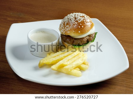 Hamburger with french fries. closeup American style