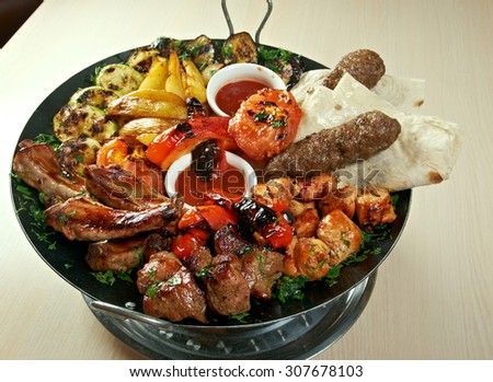 shish kebab mix. Various types  mat roasted with vegetable closeup