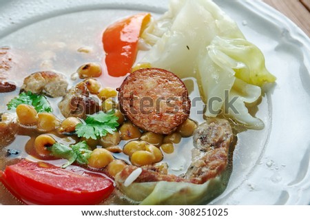 Puchero -  stew originally from Spain, prepared inMexico, Argentina, Colombia, Paraguay, Uruguay. basic ingredients of the broth are meat ,chickpeas, cabbage