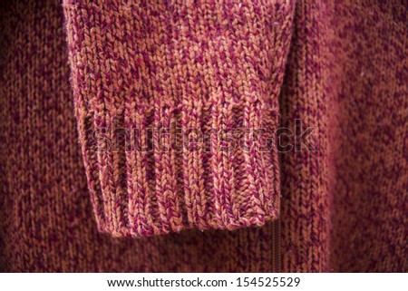 red wool Knitting sweater sleeve