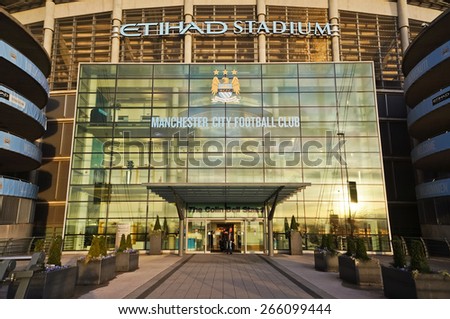 MANCHESTER, UK - FEBRUARY 10, 2014: The entrance of Etihad stadium in the evening light on February10, 2014 in Manchester, UK. Etihad stadium is home to Manchester City football club.