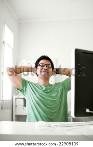 Man stretching at workplace
