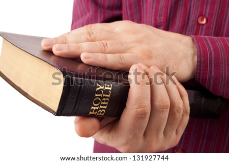 Man Holding a Bible isolated on white background
