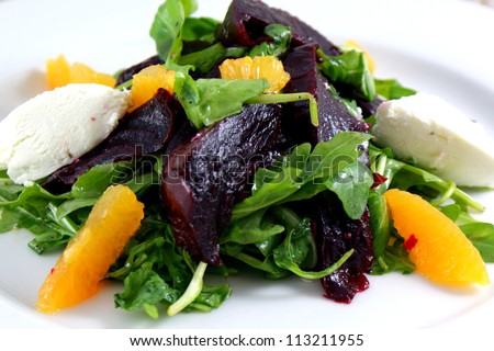 Beet salad - Beet salad with arugula, orange, roasted beets and goat cheese mouse.