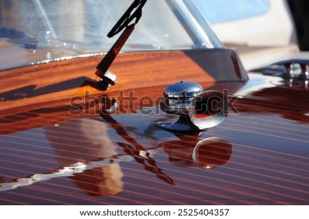 Similar – Image, Stock Photo Artisan polishing wooden detail using sandpaper in carpentry workshop