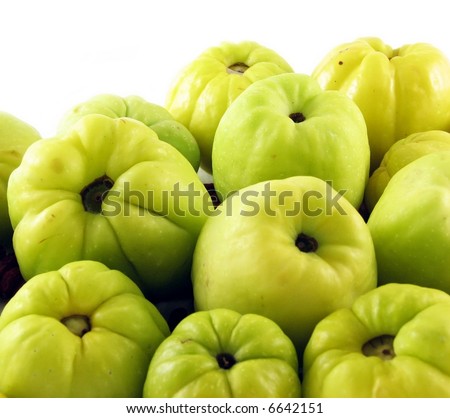 nature composition on white: fruits of quinces