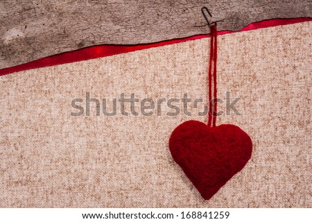 Valentine background with hand-sewn heart