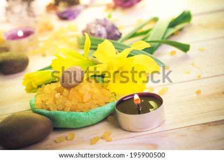 Spa concept with scented candle and salt bath