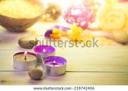 Attributes of relaxation at the spa on a wooden table