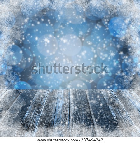 Winter background: Graphics winter with snow and wooden table to projects with space for text or product