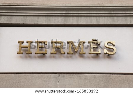 Florence, ITALY - December 8, 2011: Hermes Florence Store Logo Italy mounted on the marble wall of Hermes Store at Via de\' Tornabuoni, the heart of Florence high-class shopping district
