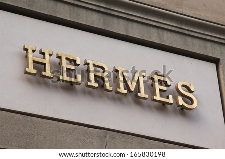 Florence, ITALY - December 8, 2011: Hermes Florence Store Logo Italy mounted on the marble wall of Hermes Store at Via de\' Tornabuoni, the heart of Florence high-class shopping district