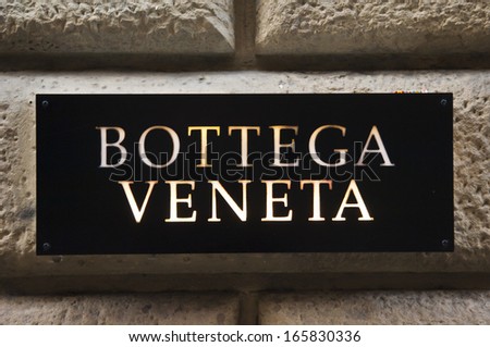 Florence, ITALY - December 8, 2011: Bottega Veneta Florence Store Logo Italy mounted on the marble wall of Bottega Veneta Store at Via de\' Tornabuoni,the heart of Florence high-class shopping district