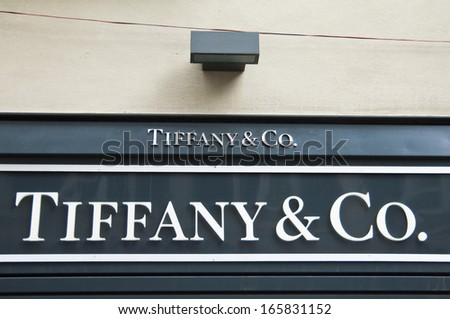 Florence, ITALY - December 8, 2011: Tiffany Florence Store Logo Italy mounted on the marble wall of Tiffany Store at Via de\' Tornabuoni, the heart of Florence high-class shopping district