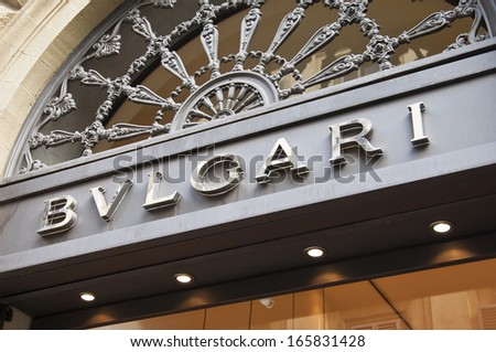Florence, Italy - December 8, 2011: Bulgari Logo mounted on the marble wall of Bulgari Store at Via de\' Tornabuoni, the heart of Florence high-class shopping district