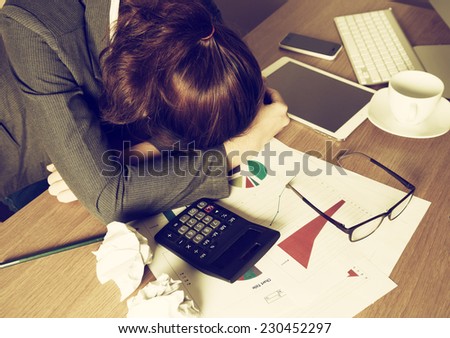 Tired businesswoman sleeping on the desk with vintage style