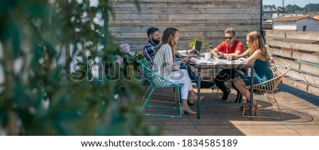 Similar – Image, Stock Photo Laptop on terrace table in front of flowers