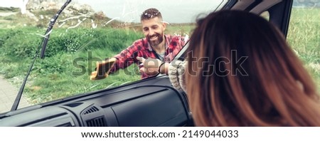 Similar – Image, Stock Photo Man cleaning motorhome glass outdoor