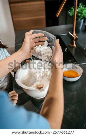 Similar – Image, Stock Photo Anonymous person preparing homemade lemon cake