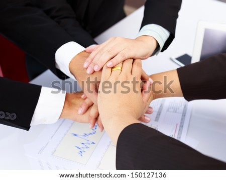 Businesspeople join hands concept working together or teamwork