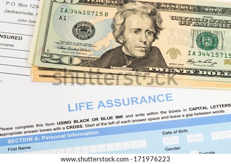 Life assurance application form with banknote concept for life planning