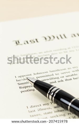 Last will on cream color paper focus at pen concept for legal document