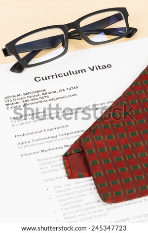 Curriculum vitae or CV with glasses, and neck tie; concept job applying