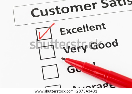 Customer satisfaction survey checkbox and pen with excellent tick