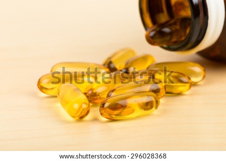 Fish oil capsule food supplement with bottle