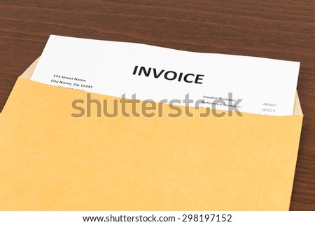Invoice in envelope; invoice is mock-up