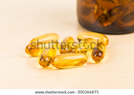 Fish oil capsule food supplement with bottle